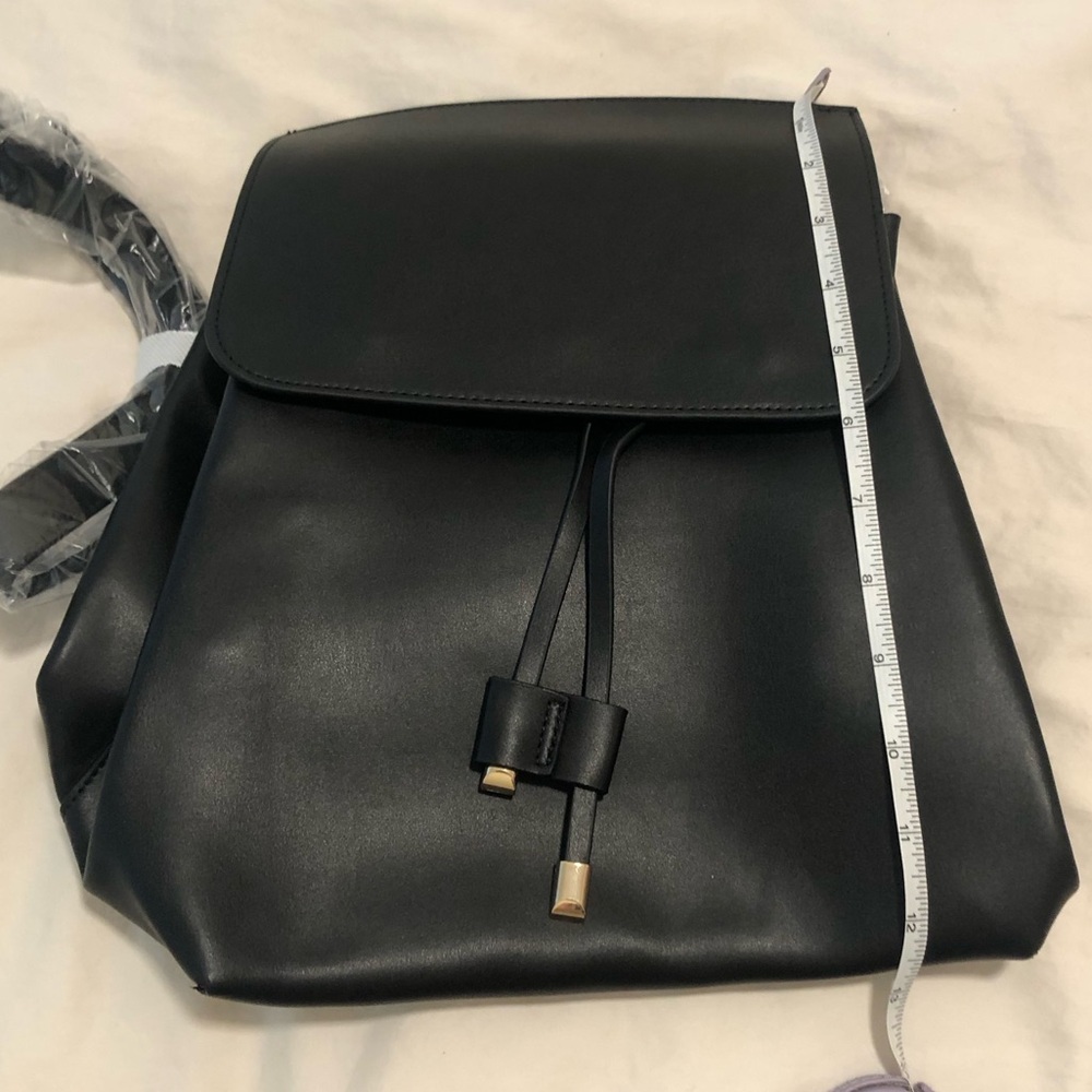Black faux leather backpack gold hardware